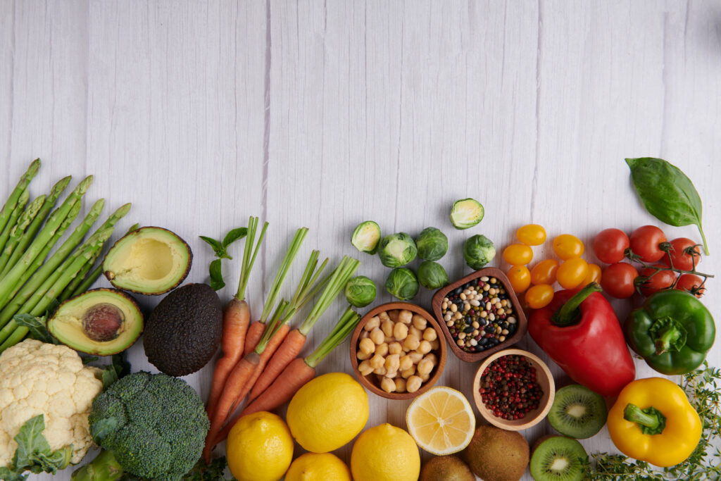 Healthy food background. Food photography different fruits and v arrangement of various fruits and vegetables
